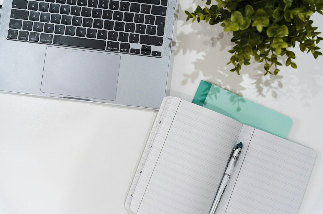 green file folders on desk